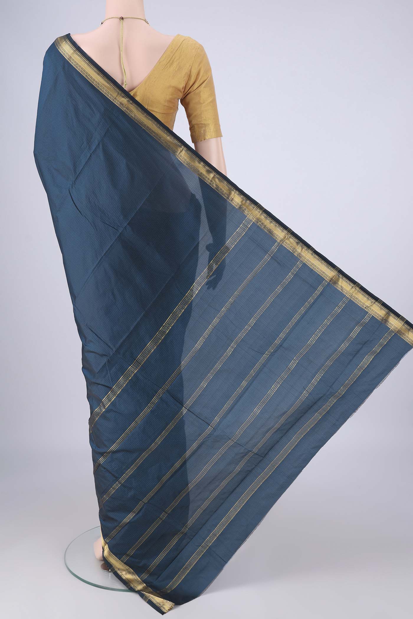 Flat view of Blue Blended Bangalore Silk Saree with Jacquard design on the body and Zari Border. 