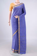 Light Blue Blended Bangalore Silk Saree with Jacquard design on the body and Zari Border.  displayed on a mannequin