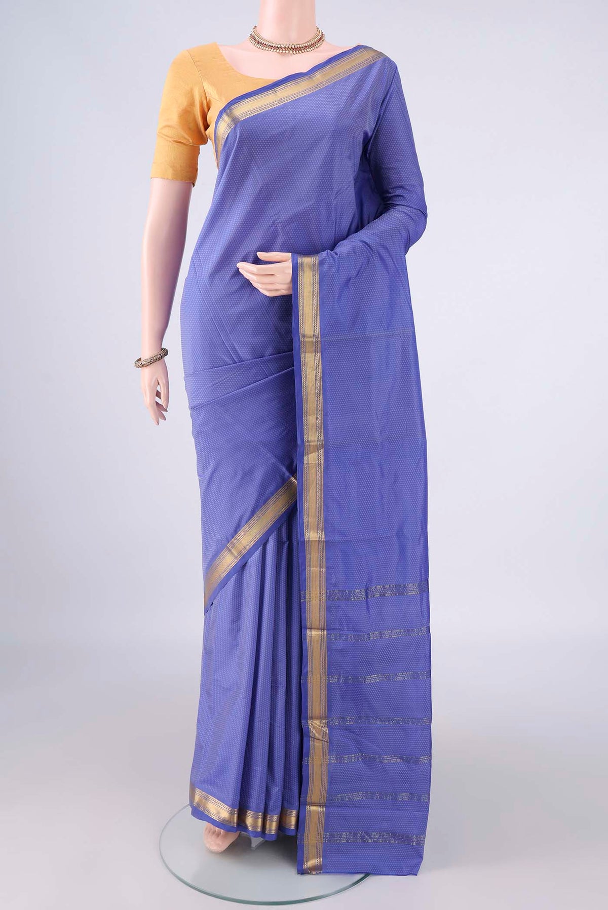 Light Blue Blended Bangalore Silk Saree with Jacquard design on the body and Zari Border.  displayed on a mannequin