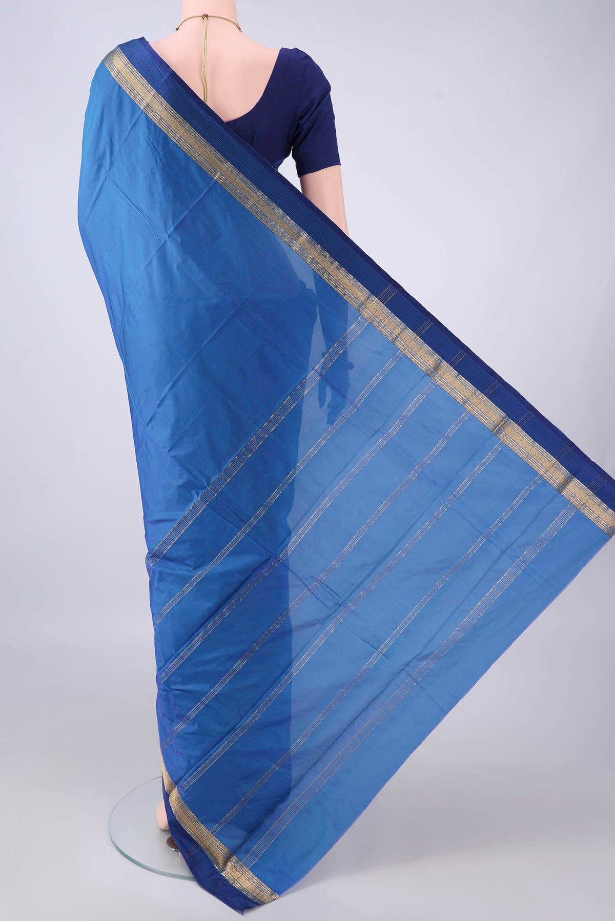 Flat view of Blue Blended Bangalore Silk Saree with Plain Body and Zari And Thread Border. 