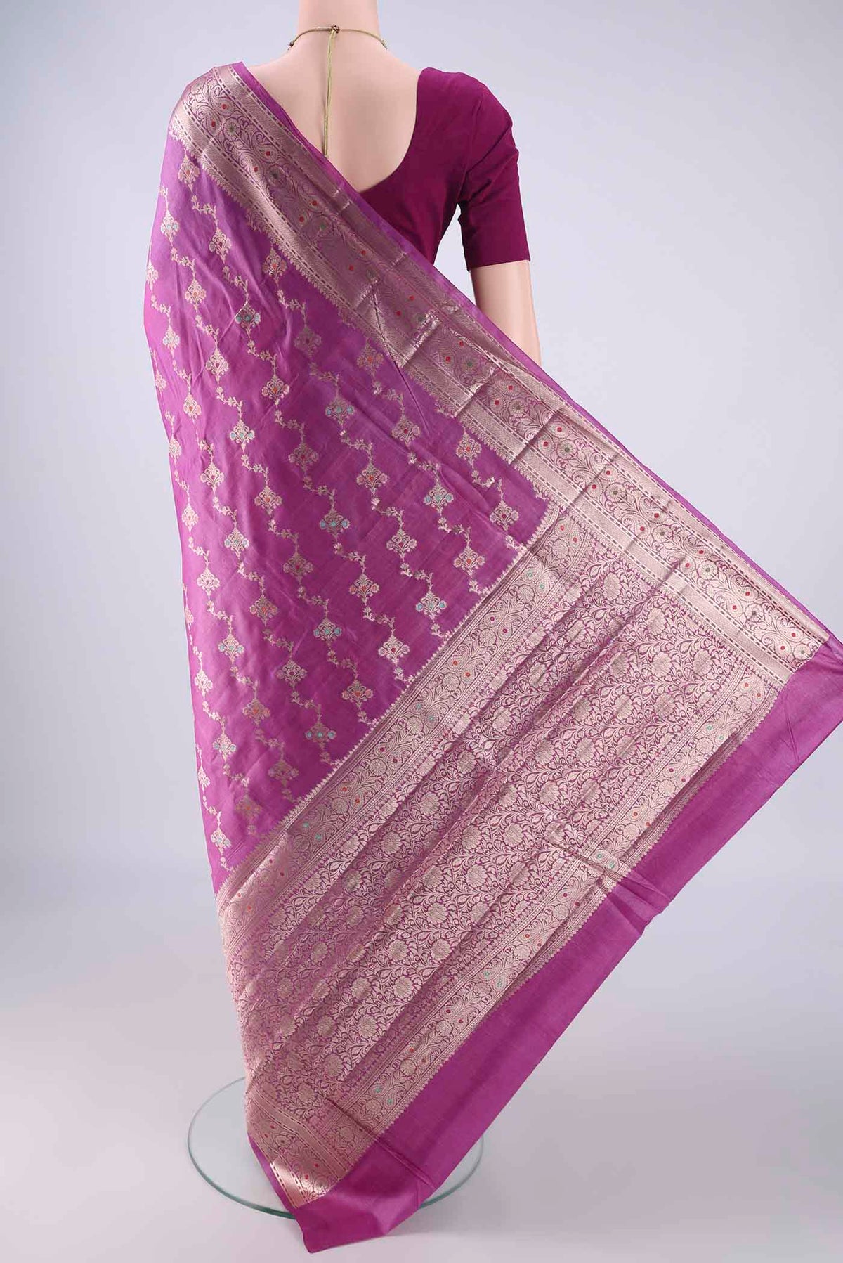 Flat view of Magenta Banarasi Tussar Silk Saree with Zari And Thread Butta on the body and Zari Border. 