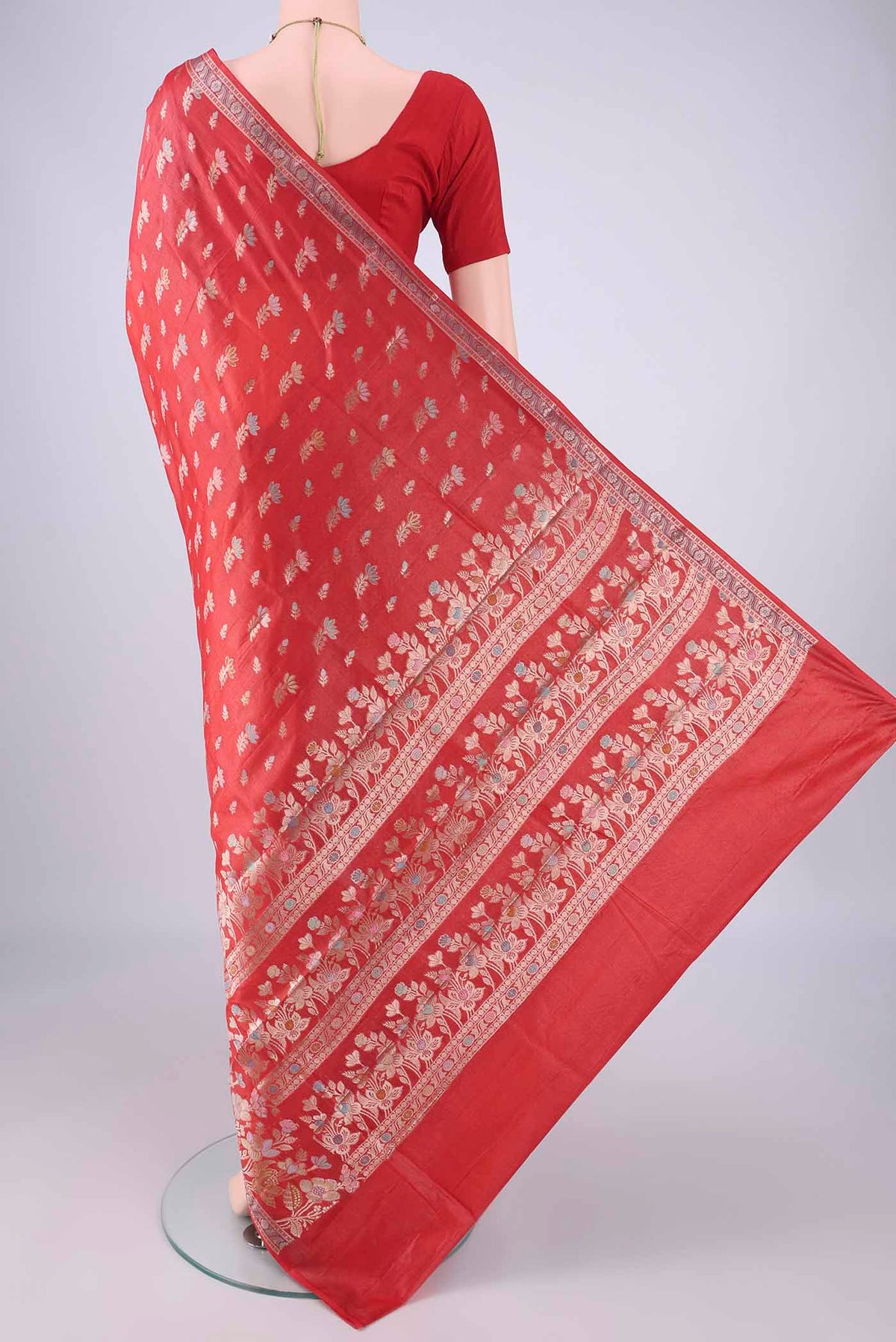 Flat view of Imperial Red Banarasi Tussar Silk Saree with Zari And Thread Butta on the body and Zari Border. 