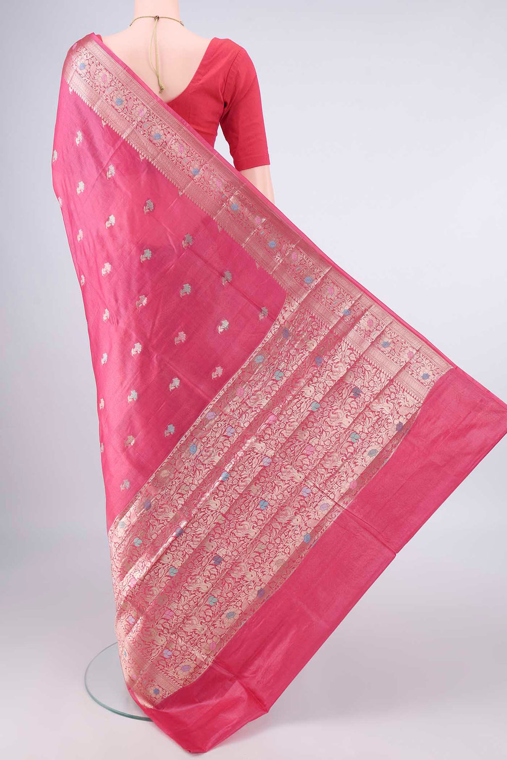 Flat view of Rani Pink Banarasi Tussar Saree with Zari And Thread Butta on the body and Zari And Thread Border. 