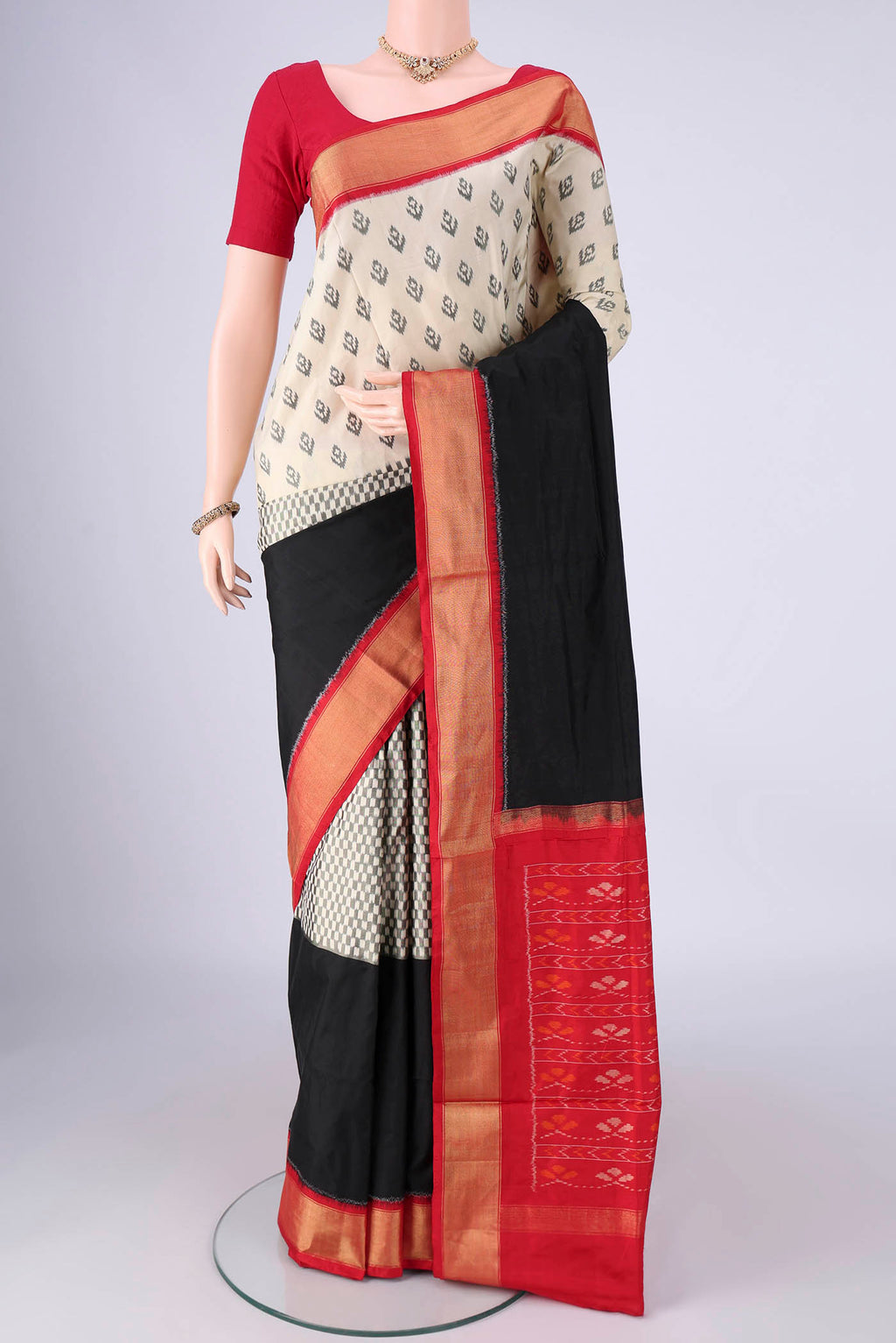 Multi Color Pochampally Silk Saree with Half And Half on the body and Zari Border.  displayed on a mannequin