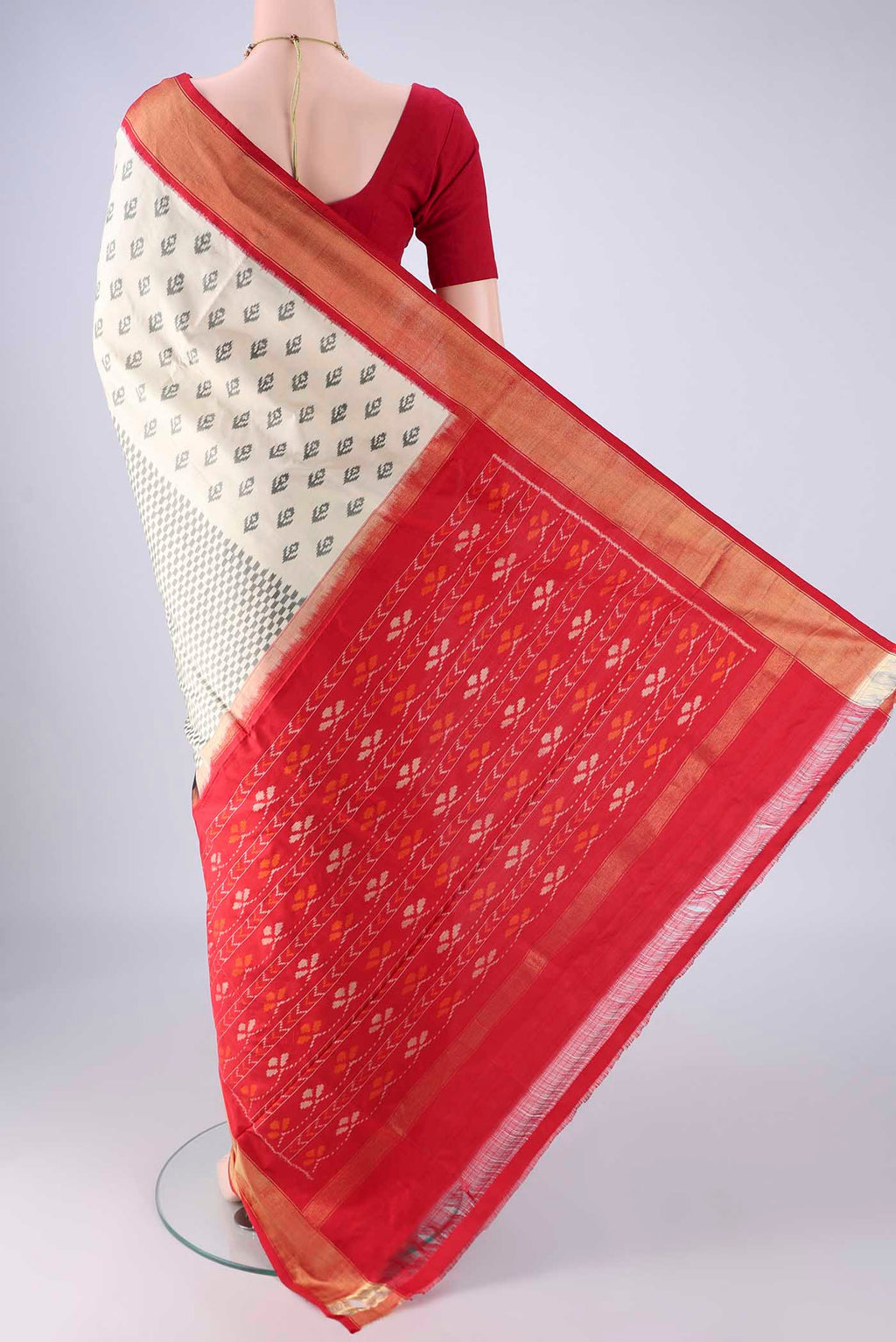 Flat view of Multi Color Pochampally Silk Saree with Half And Half on the body and Zari Border. 