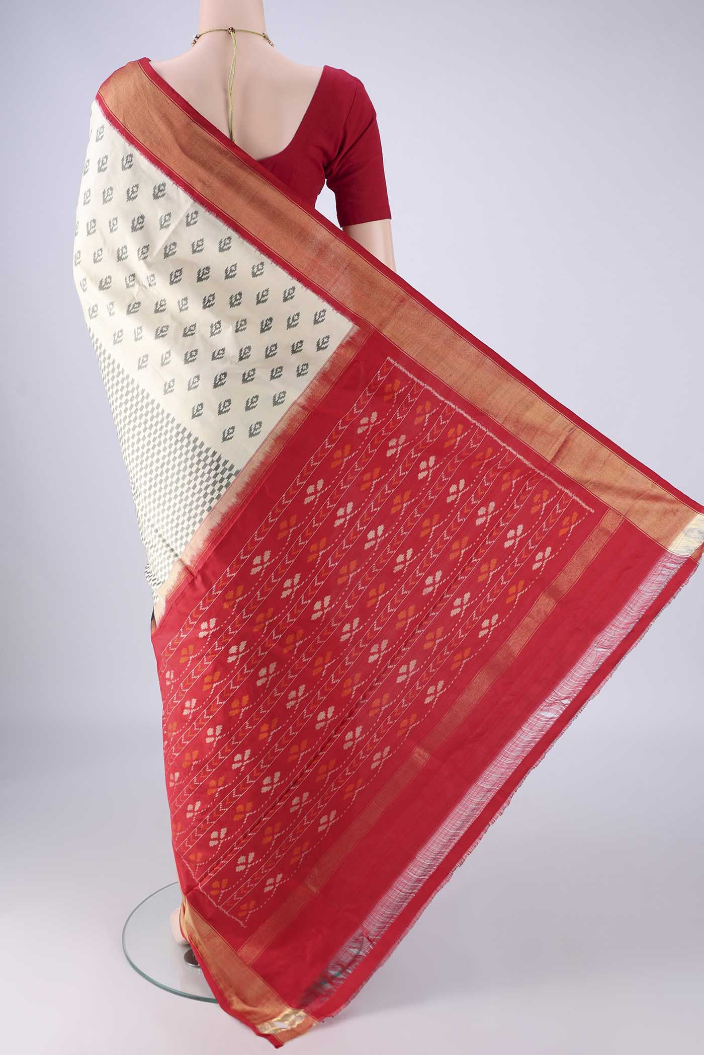 Flat view of Multi Color Pochampally Silk Saree with Half And Half on the body and Zari Border. 