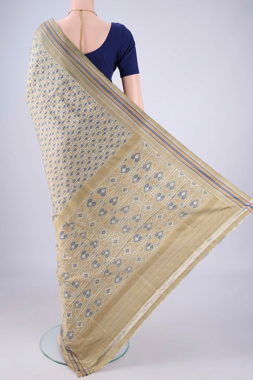 Flat view of Sage Green Pochampally Silk Saree with Pure Ikat on the body and Plain Border. 