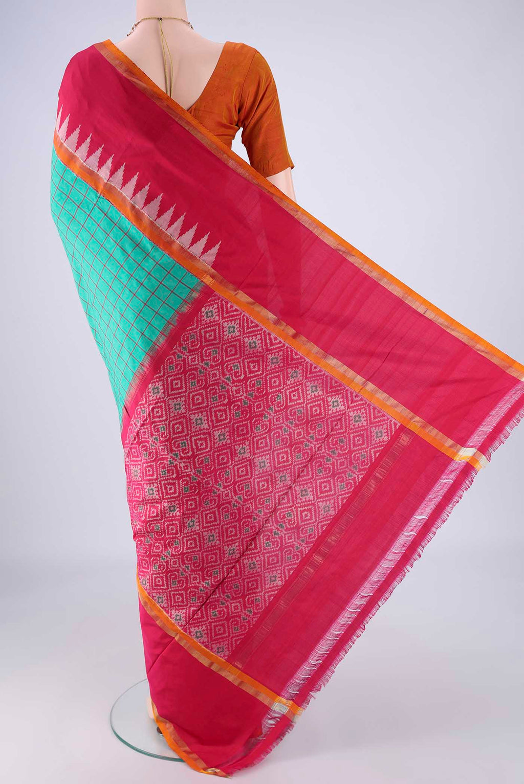 Flat view of Sea Green Pochampally Silk Saree with Checked design on the body and Temple Border. 