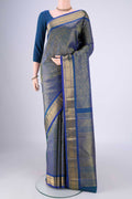 Pure Silk Pure Zari Blue Kanjivaram Saree with Zari Brocade on the body and Zari Border.  displayed on a mannequin