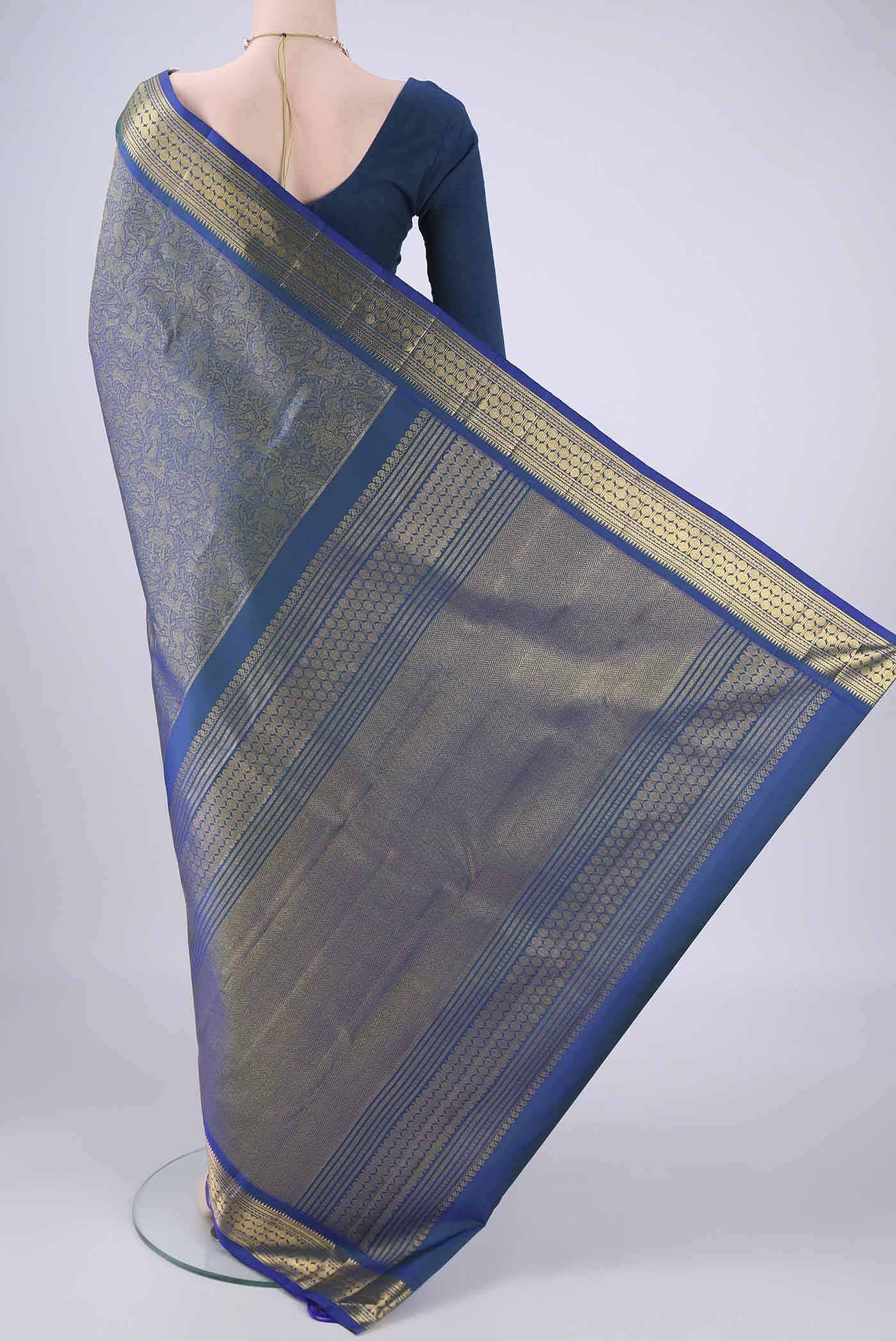 Flat view of Pure Silk Pure Zari Blue Kanjivaram Saree with Zari Brocade on the body and Zari Border. 