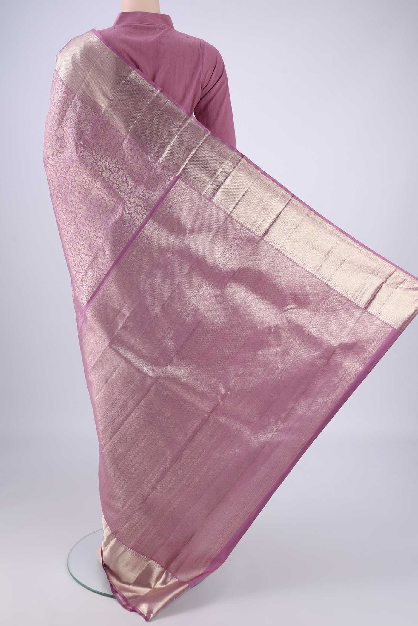 Flat view of Mauve Kanchipuram Silk Saree with Zari Brocade on the body and Zari Border. 