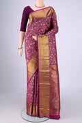 Purple Kanjivaram Silk Saree with Zari Brocade on the body and Zari Border.  displayed on a mannequin