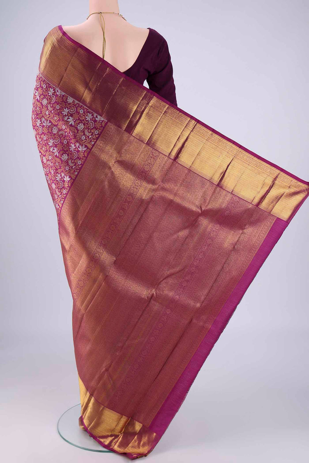 Flat view of Purple Kanjivaram Silk Saree with Zari Brocade on the body and Zari Border. 