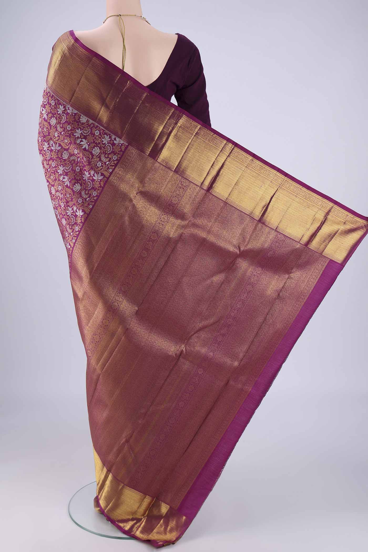 Flat view of Purple Kanjivaram Silk Saree with Zari Brocade on the body and Zari Border. 