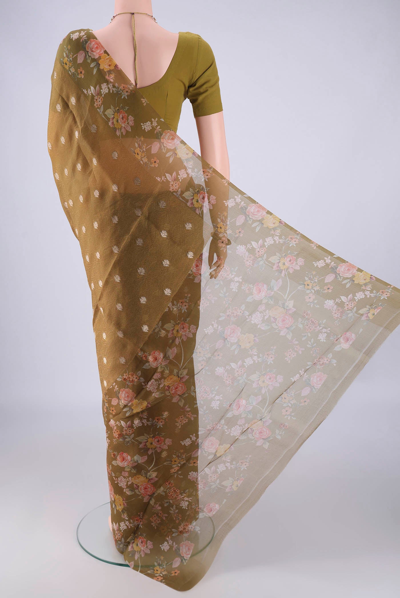 Flat view of Mehandi Green Organza Silk Saree with Jacquard With Zari Butta on the body and Printed Border. 