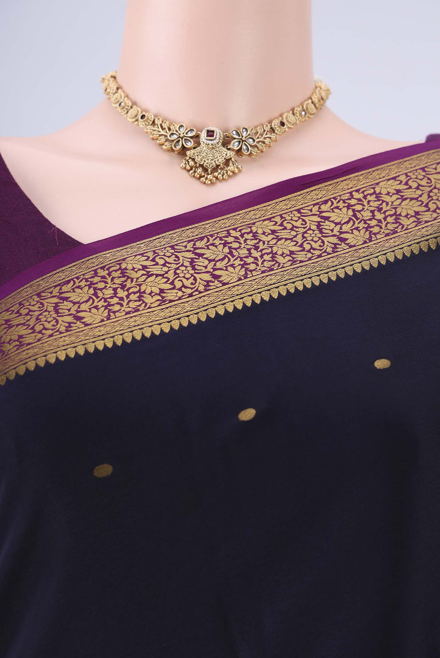 Border image of Navy Blue Mysore Crepe Saree with Zari Butta on the body and Zari Border. 