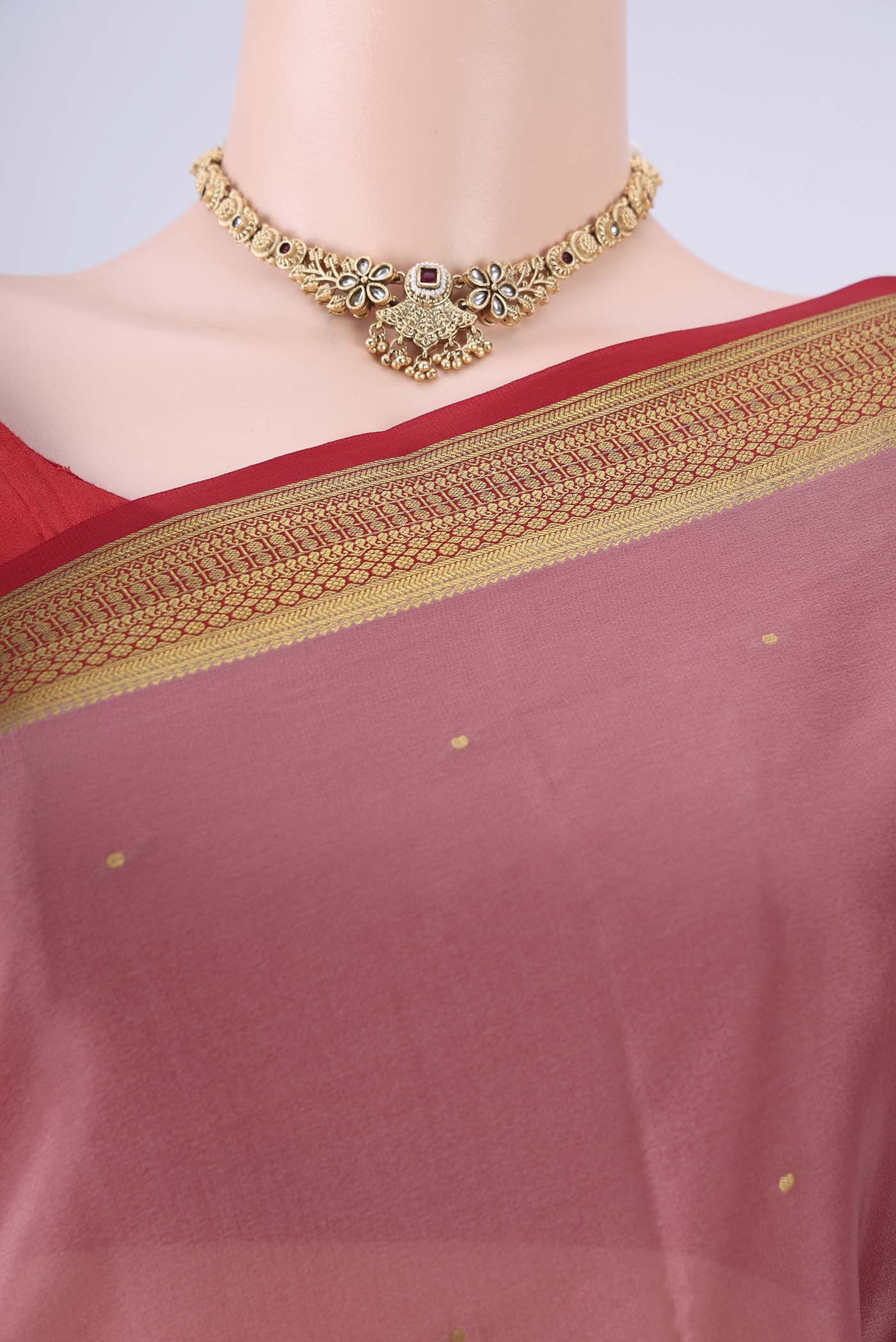 Border image of Coral Mysore Crepe Saree with Zari Butta on the body and Zari Border. 