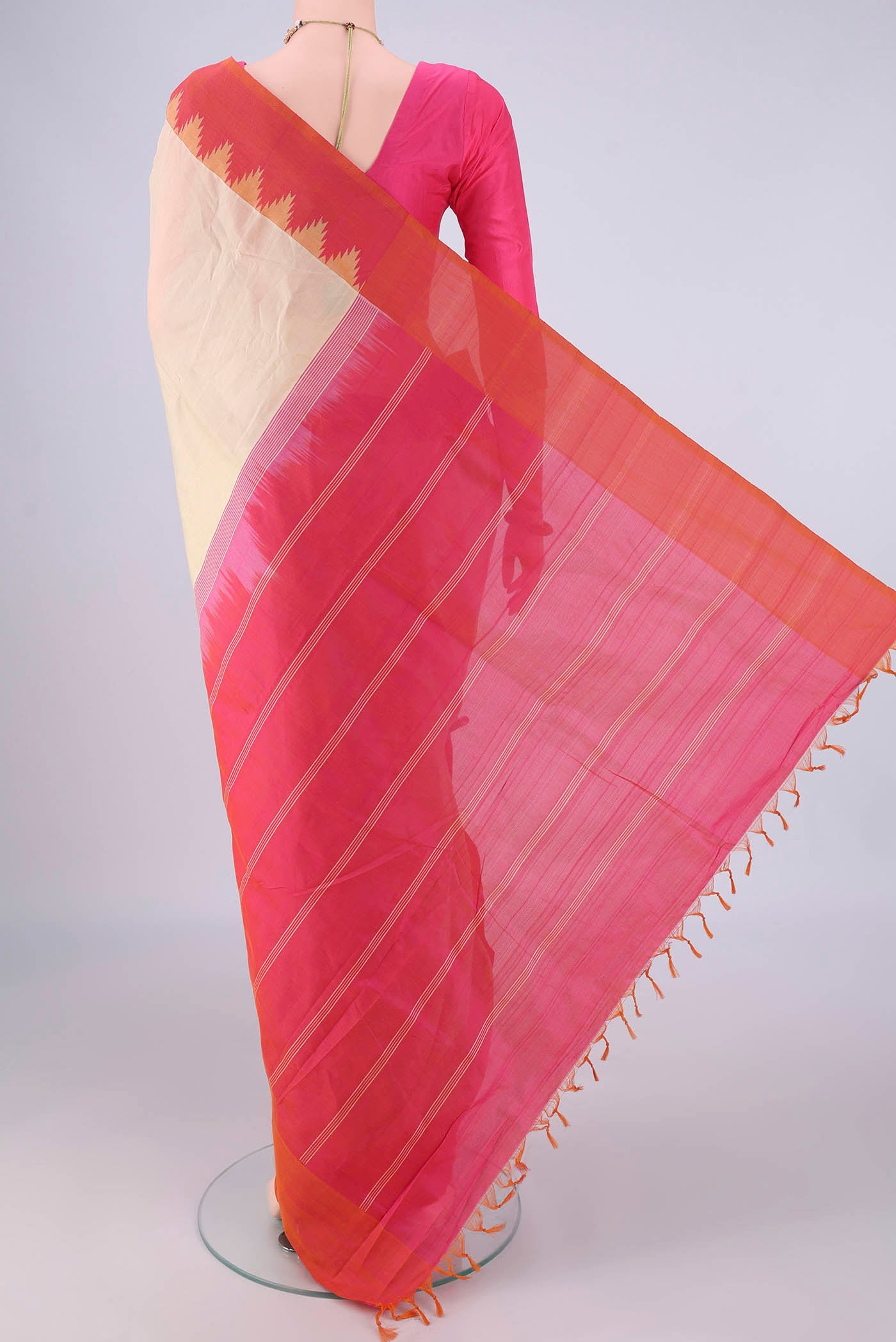 Flat view of Cream Coimbatore Silk Cotton Saree with Plain Body and Temple Border. 