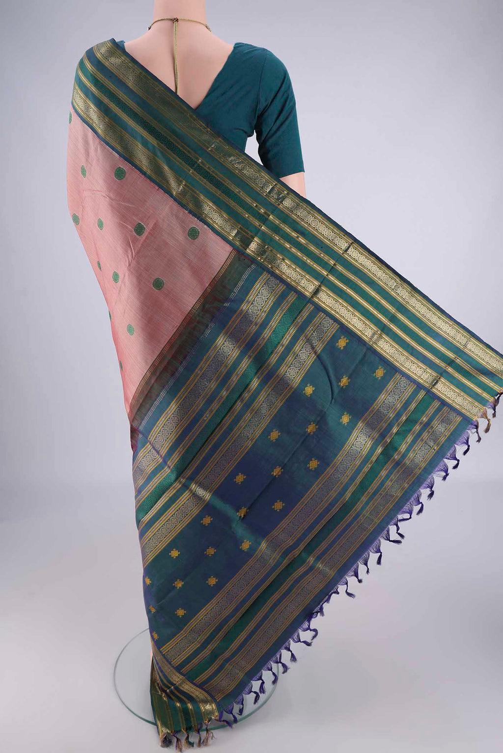 Flat view of Rose Gold Kanjivaram Silk Saree with Thread Butta on the body and Zari Border. 