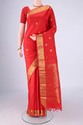 Red Kanjivaram Silk Saree with Zari Butta on the body and Zari Border.  displayed on a mannequin