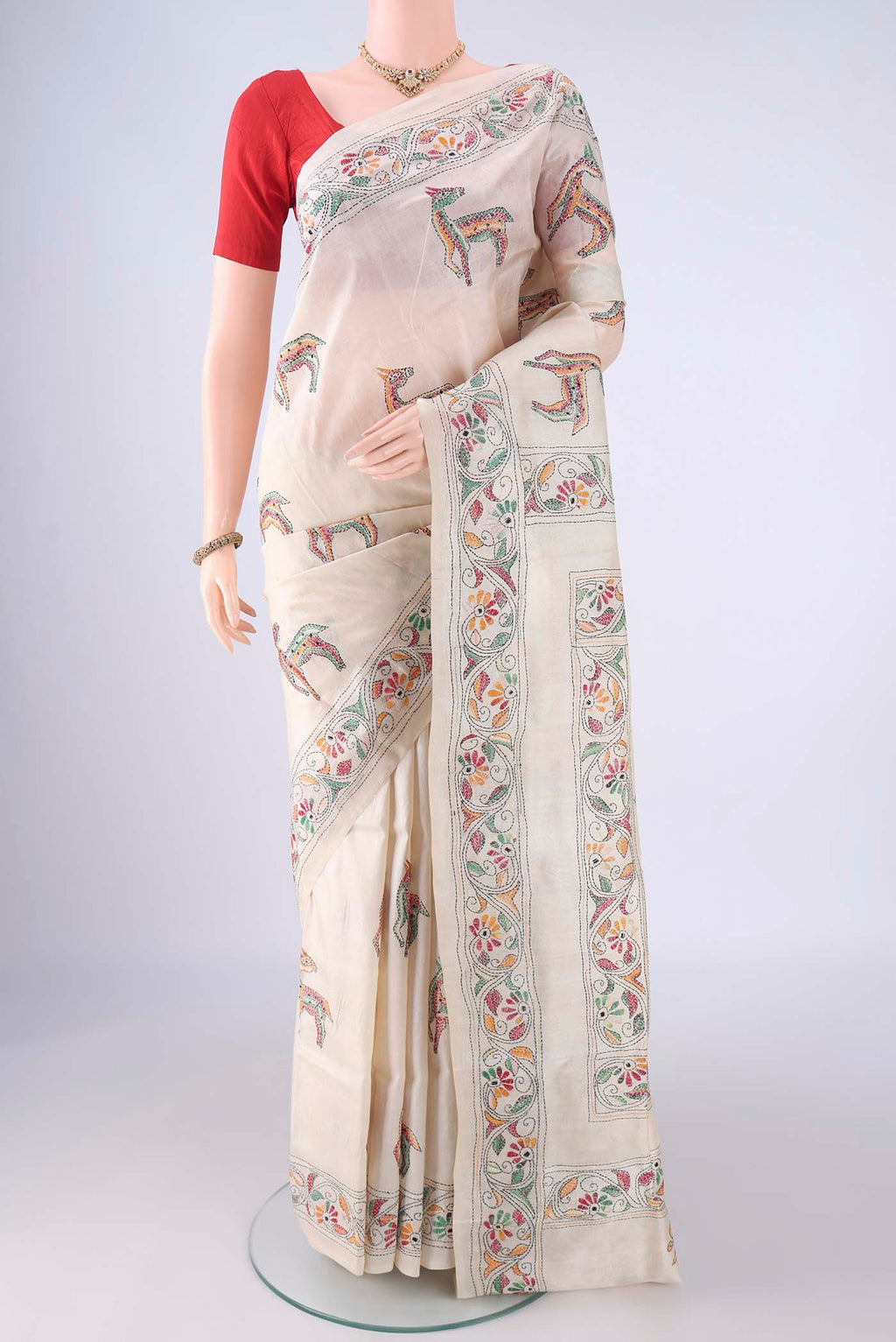 Cream Tussar Silk Saree with Kantha Work on the body and Thread Border.  displayed on a mannequin