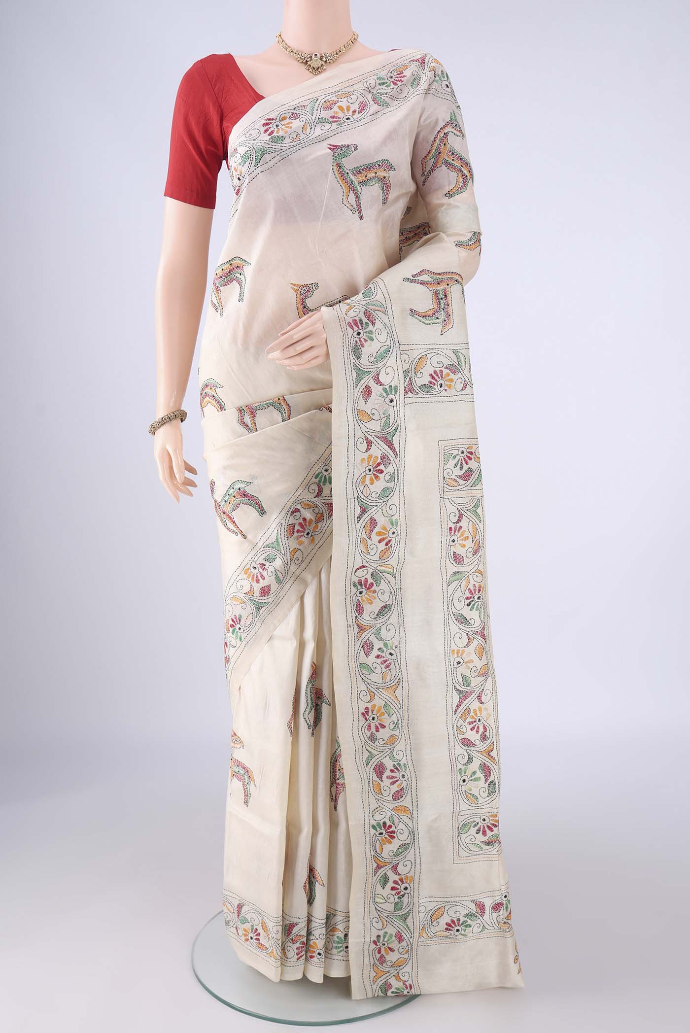 Cream Tussar Silk Saree with Kantha Work on the body and Thread Border.  displayed on a mannequin