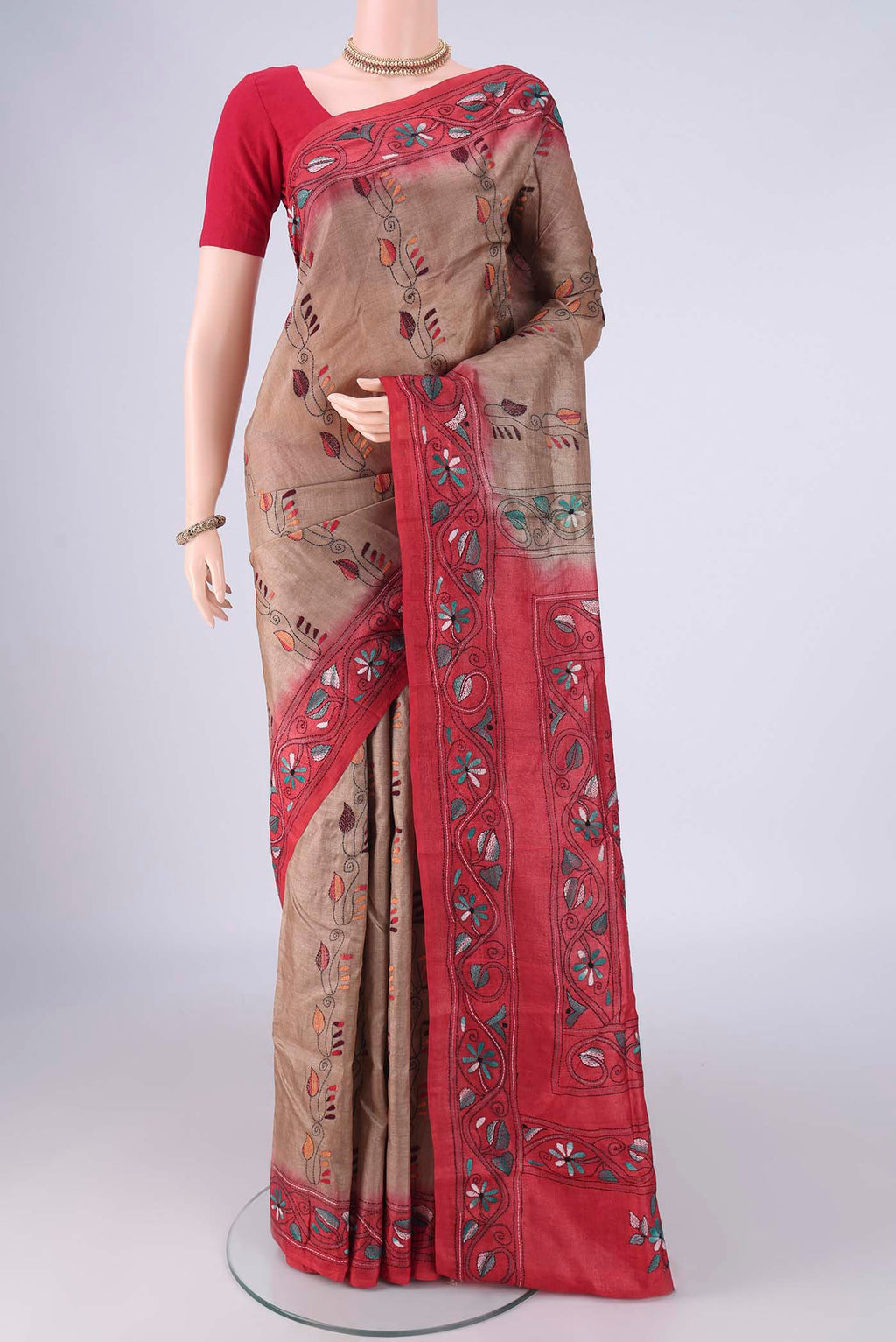 Brown Tussar Silk Saree with Kantha Work on the body and Thread Border.  displayed on a mannequin