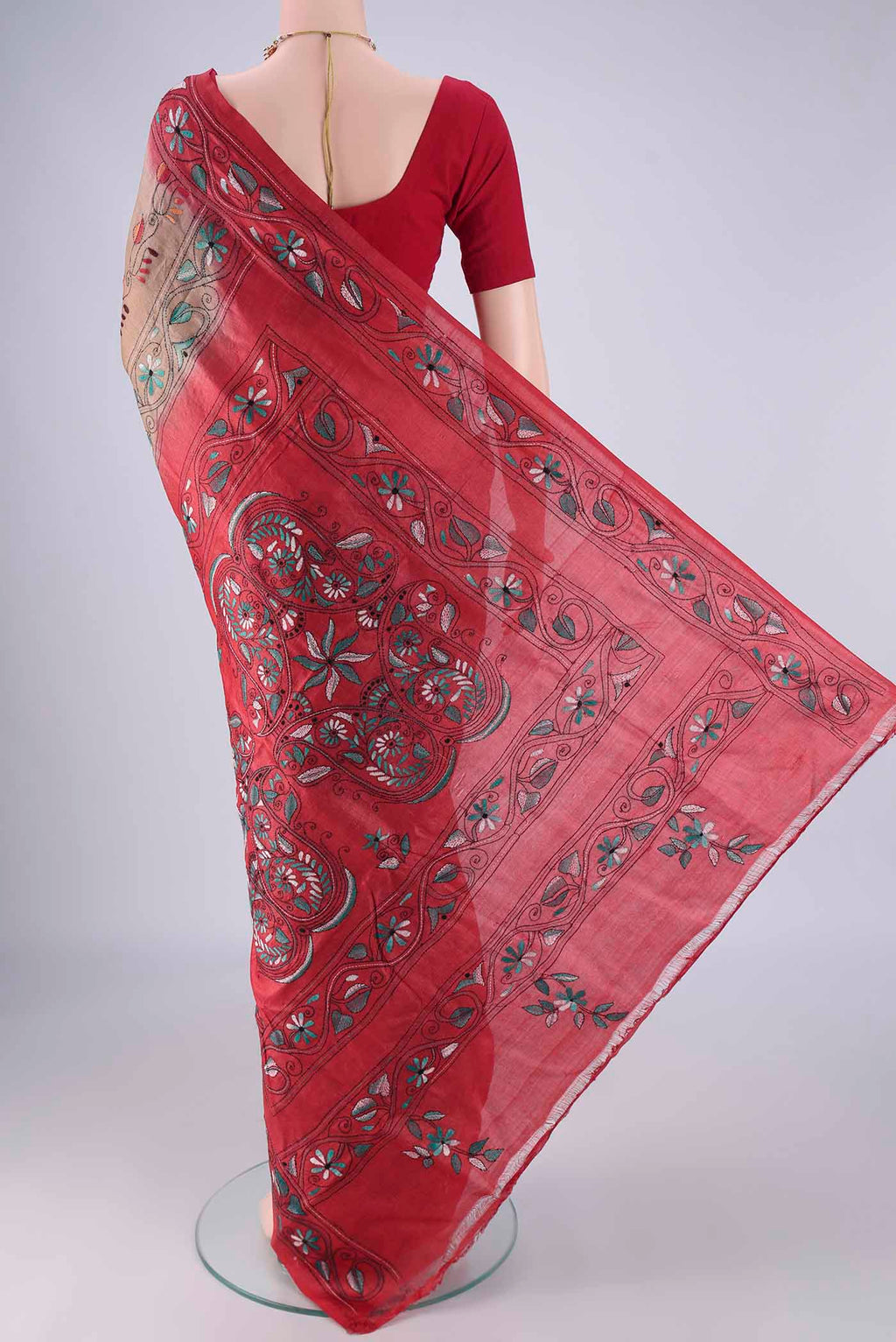 Flat view of Brown Tussar Silk Saree with Kantha Work on the body and Thread Border. 