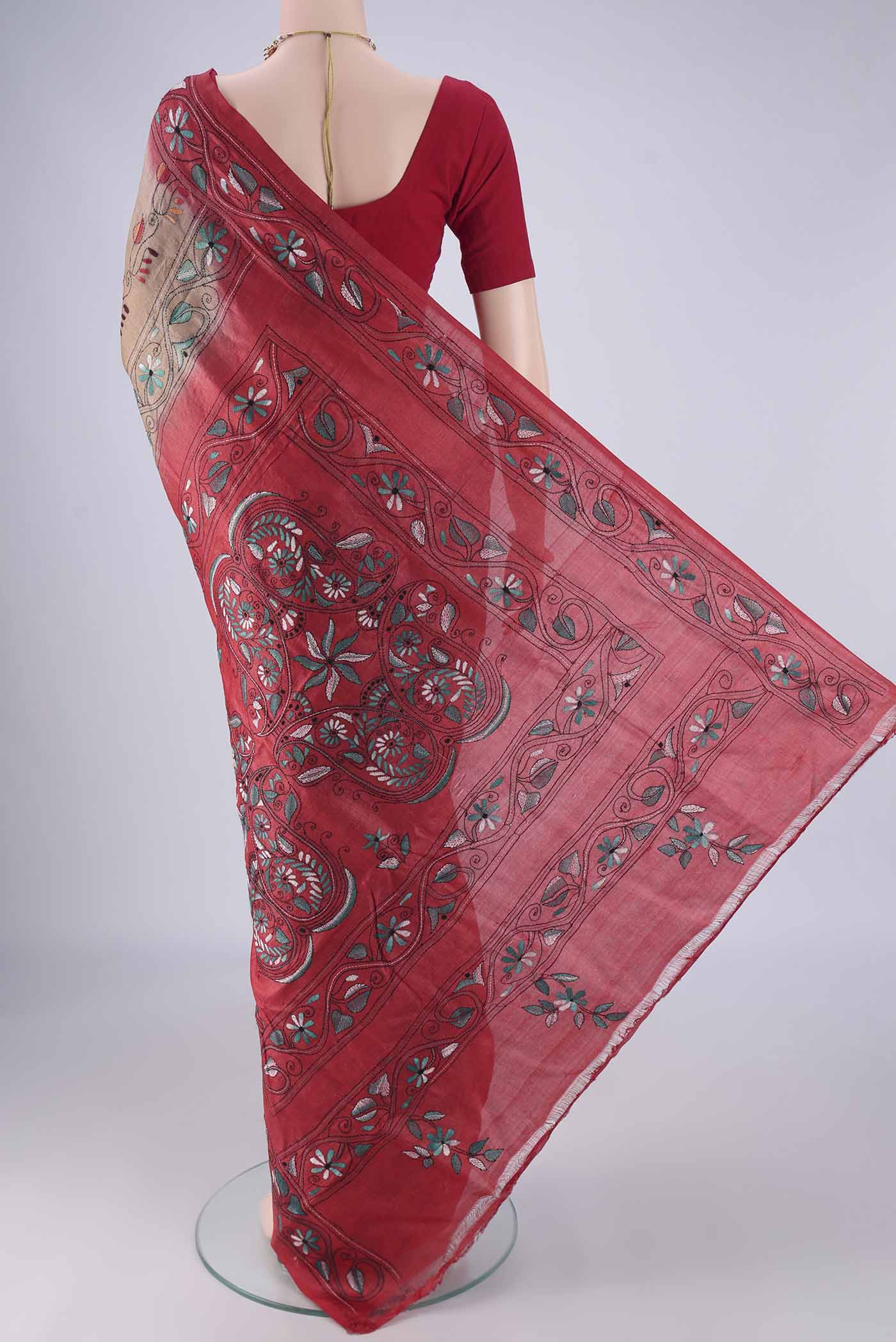 Flat view of Brown Tussar Silk Saree with Kantha Work on the body and Thread Border. 