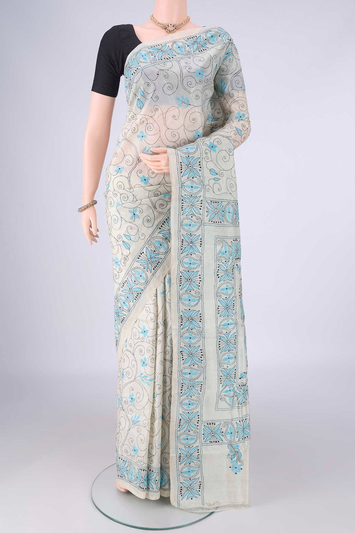Beige Tussar Silk Saree with Kantha Work on the body and Thread Border.  displayed on a mannequin