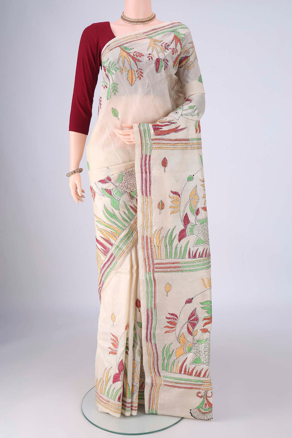 Beige Tussar Silk Saree with Kantha Work on the body and Thread Border.  displayed on a mannequin