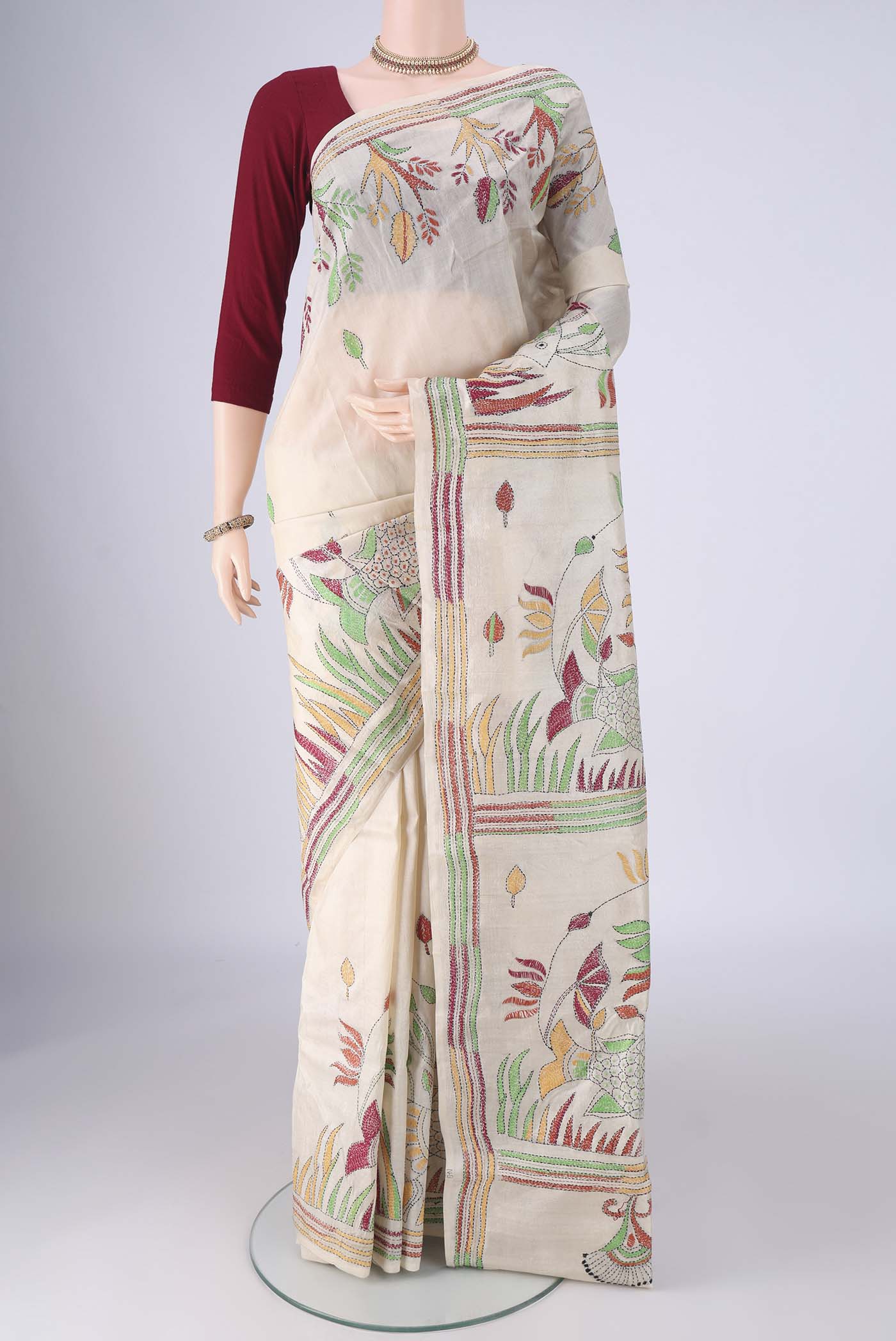 Beige Tussar Silk Saree with Kantha Work on the body and Thread Border.  displayed on a mannequin