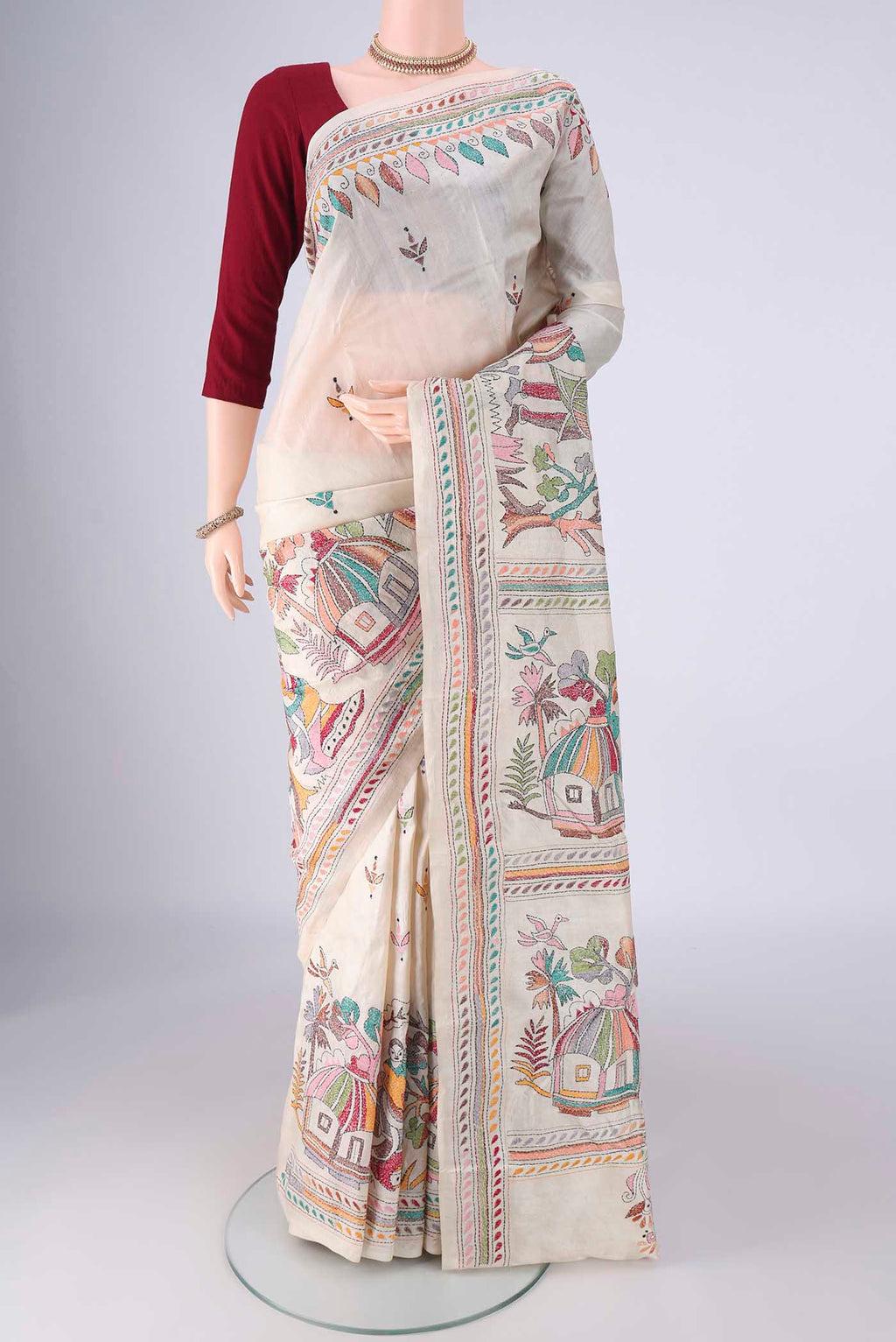 Beige Tussar Silk Saree with Kantha Work on the body and Thread Border.  displayed on a mannequin
