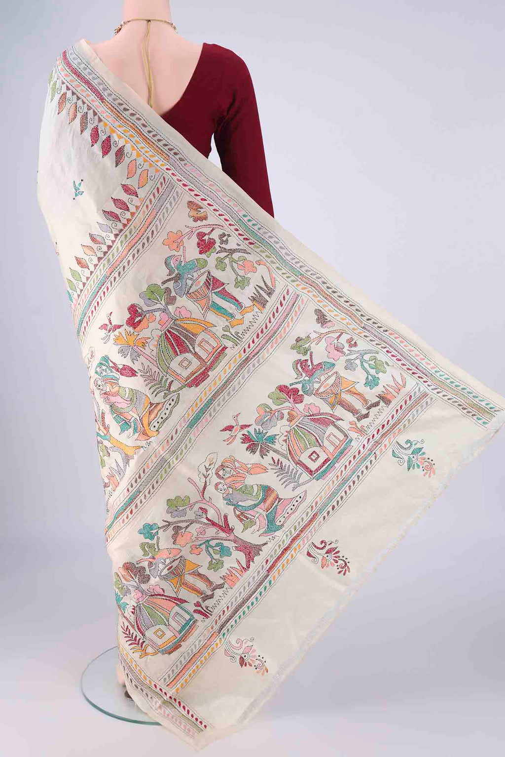 Flat view of Beige Tussar Silk Saree with Kantha Work on the body and Thread Border. 