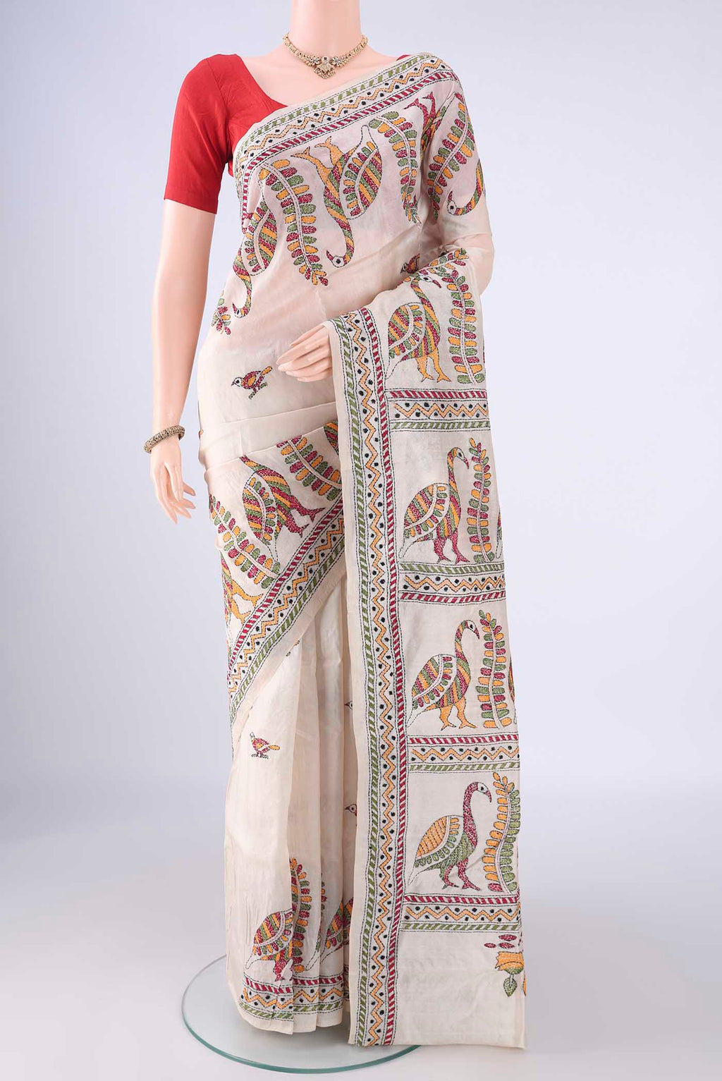 Acid Green Tussar Silk Saree with Kantha Work on the body and Thread Border.  displayed on a mannequin