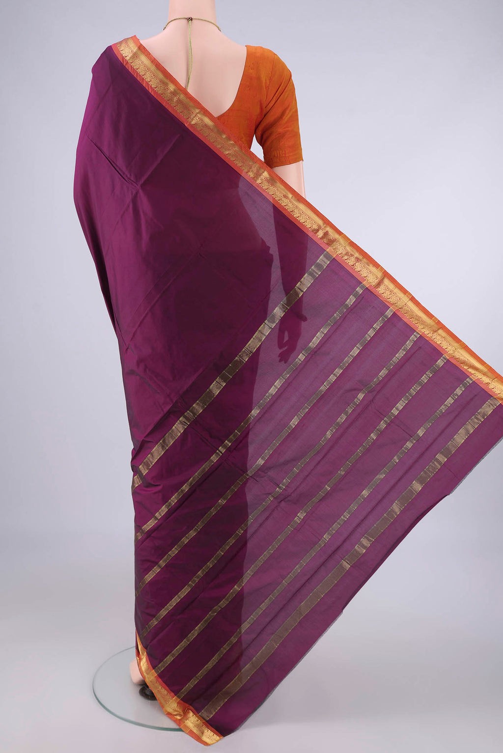 Flat view of Maroon Blended Bangalore Silk Saree with Plain Body and Zari Border. 