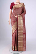 Maroon Kanchipuram Silk Saree with Zari Brocade on the body and Zari Border.  displayed on a mannequin