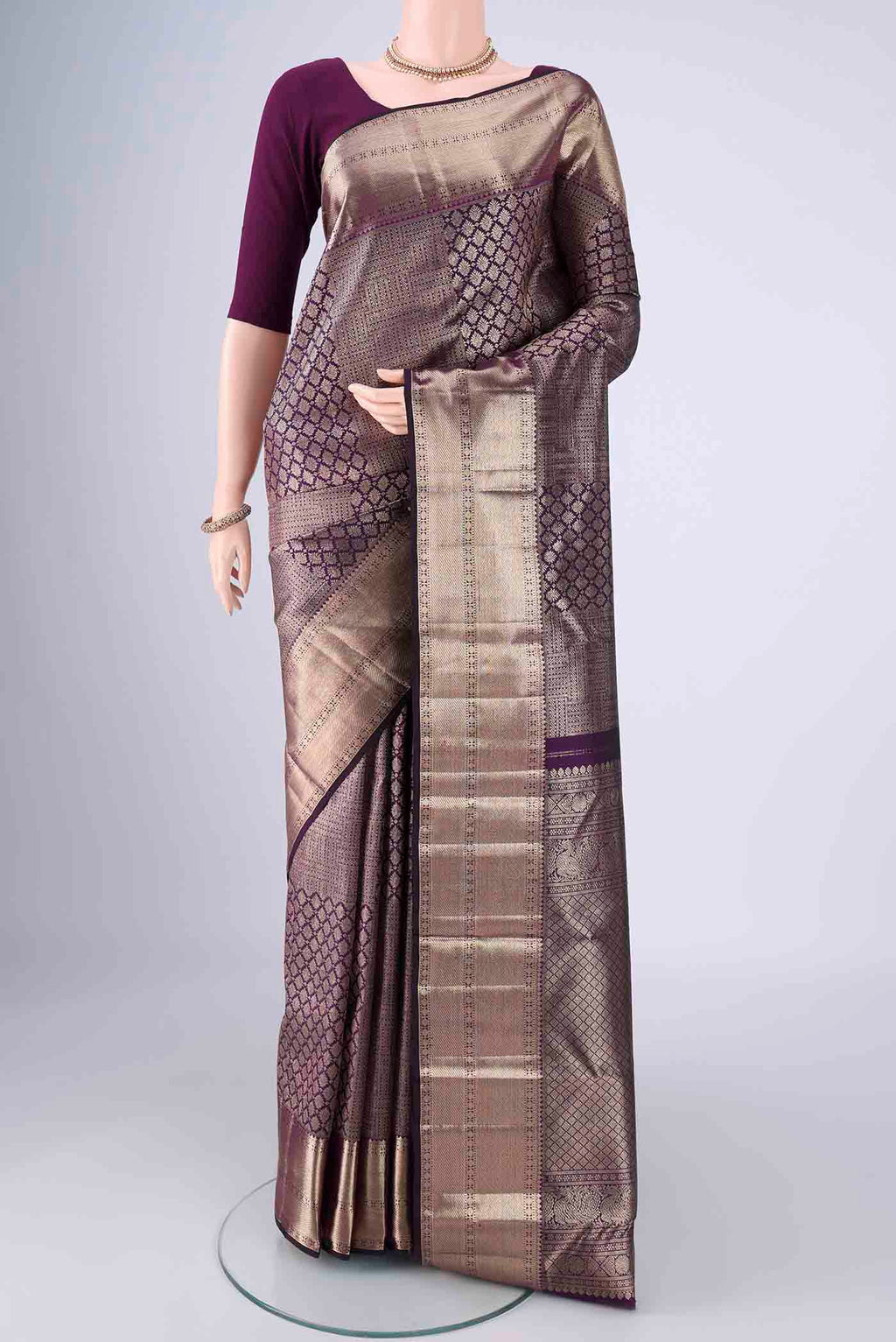 Violet Dual Tone Kanchipuram Silk Saree with Zari Brocade on the body and Zari Border.  displayed on a mannequin