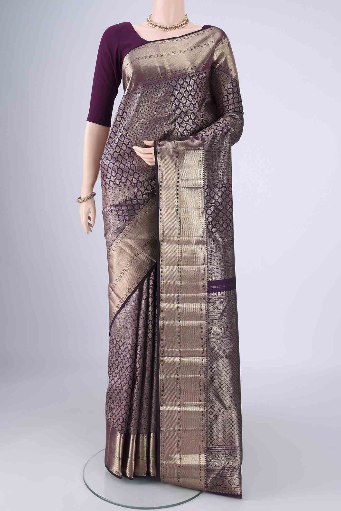 Violet Dual Tone Kanchipuram Silk Saree with Zari Brocade on the body and Zari Border.  displayed on a mannequin