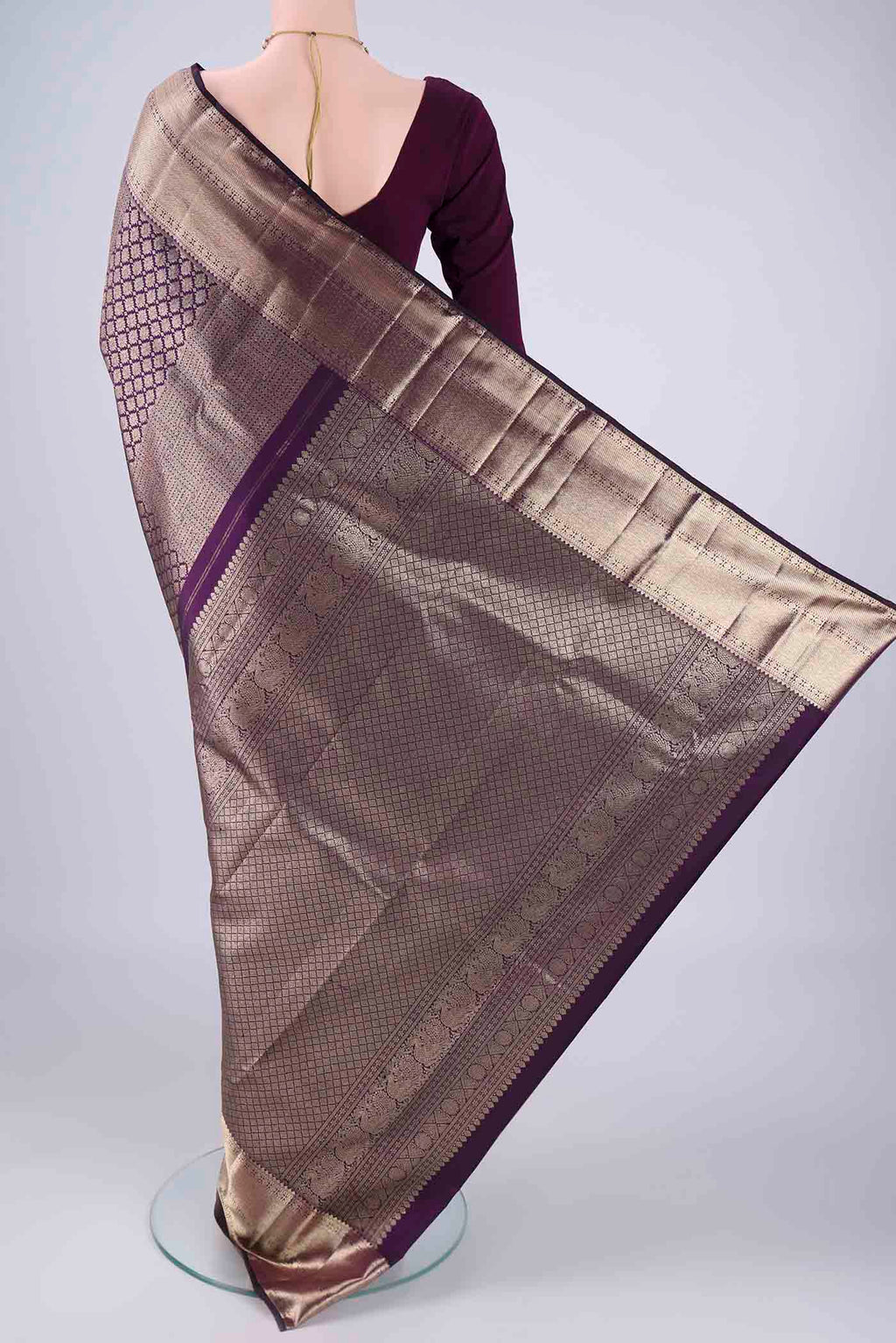 Flat view of Violet Dual Tone Kanchipuram Silk Saree with Zari Brocade on the body and Zari Border. 