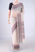 White Coimbatore Cotton Saree with Checked design on the body and Thread Border.  displayed on a mannequin