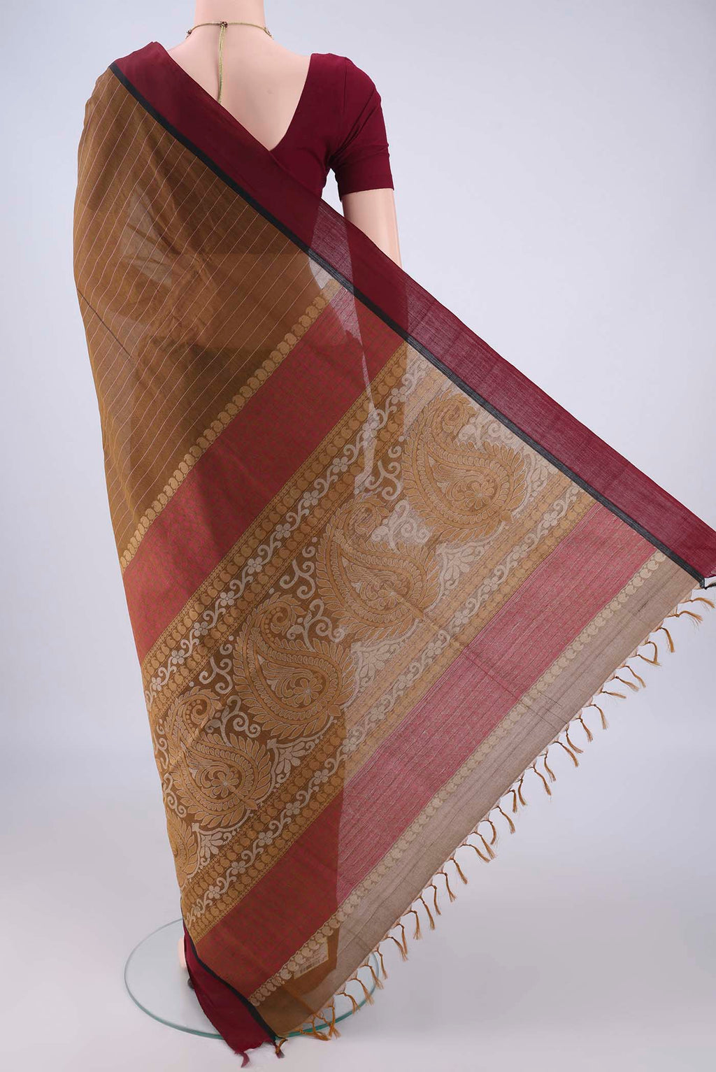Flat view of Brown Coimbatore Cotton Saree with Stripes on the body and Thread Border. 