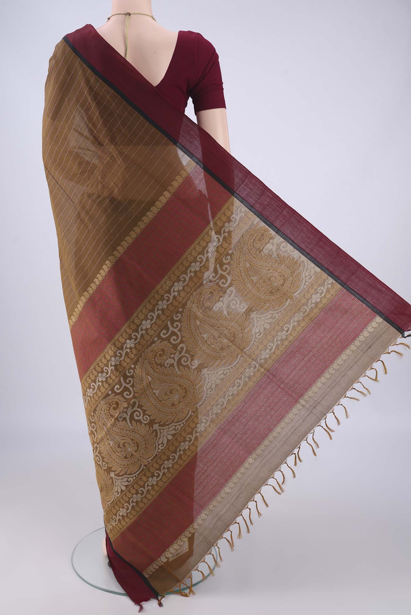 Flat view of Brown Coimbatore Cotton Saree with Stripes on the body and Thread Border. 