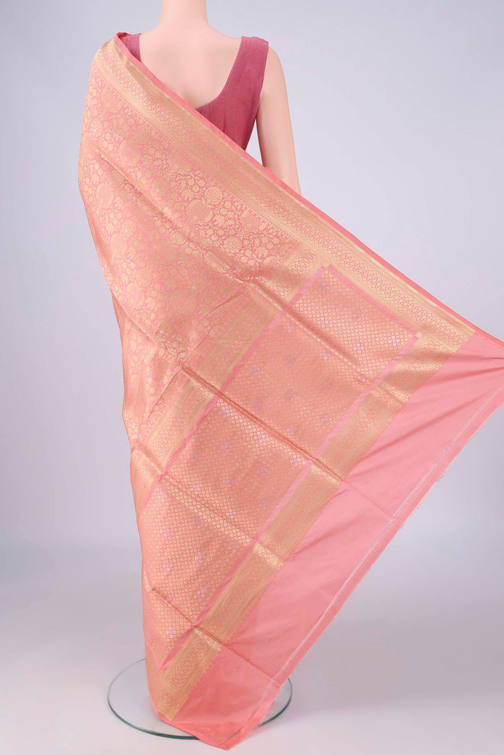 Flat view of Peach Banarasi Silk Saree with Zari Brocade on the body and Zari Border. 