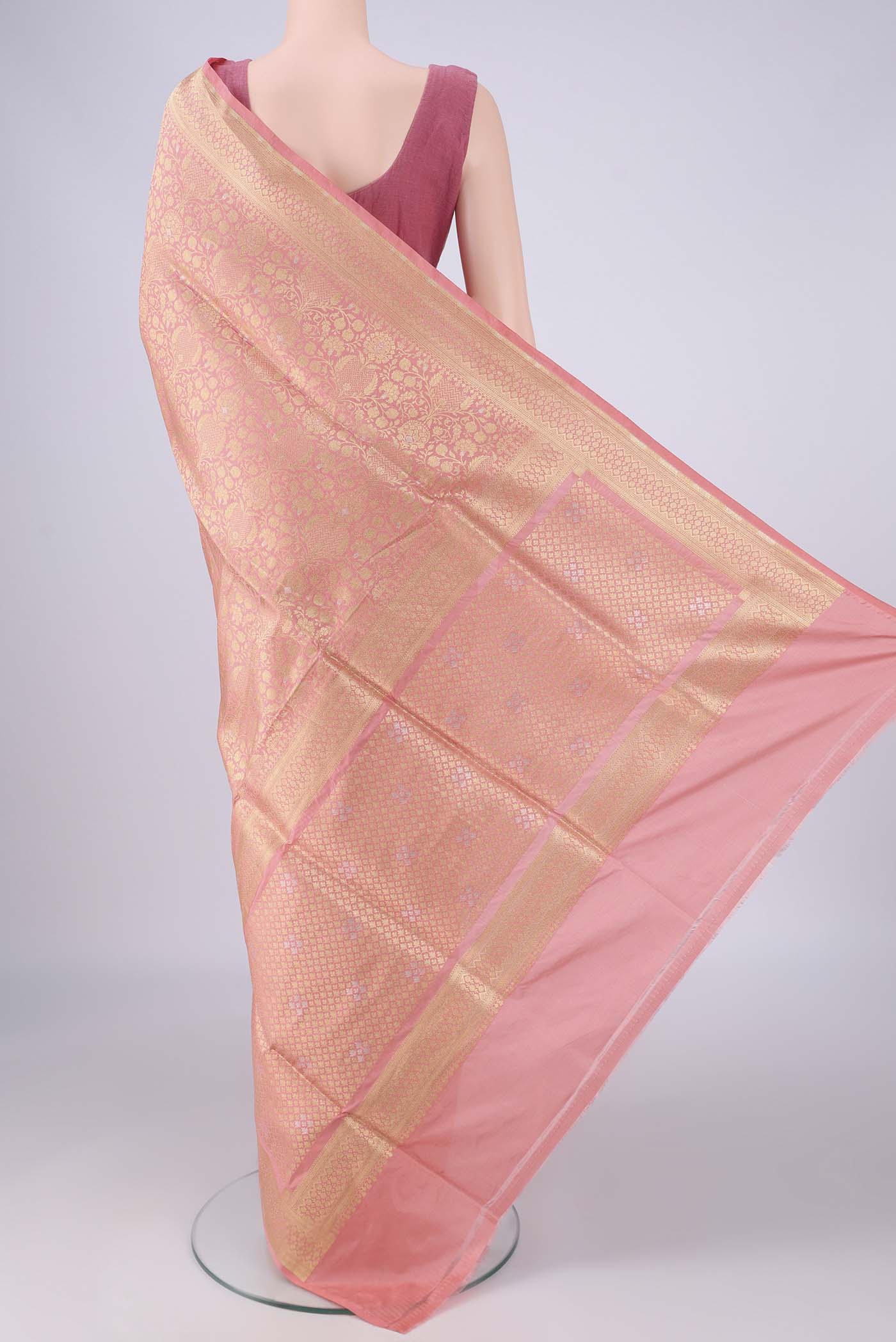 Flat view of Peach Banarasi Silk Saree with Zari Brocade on the body and Zari Border. 