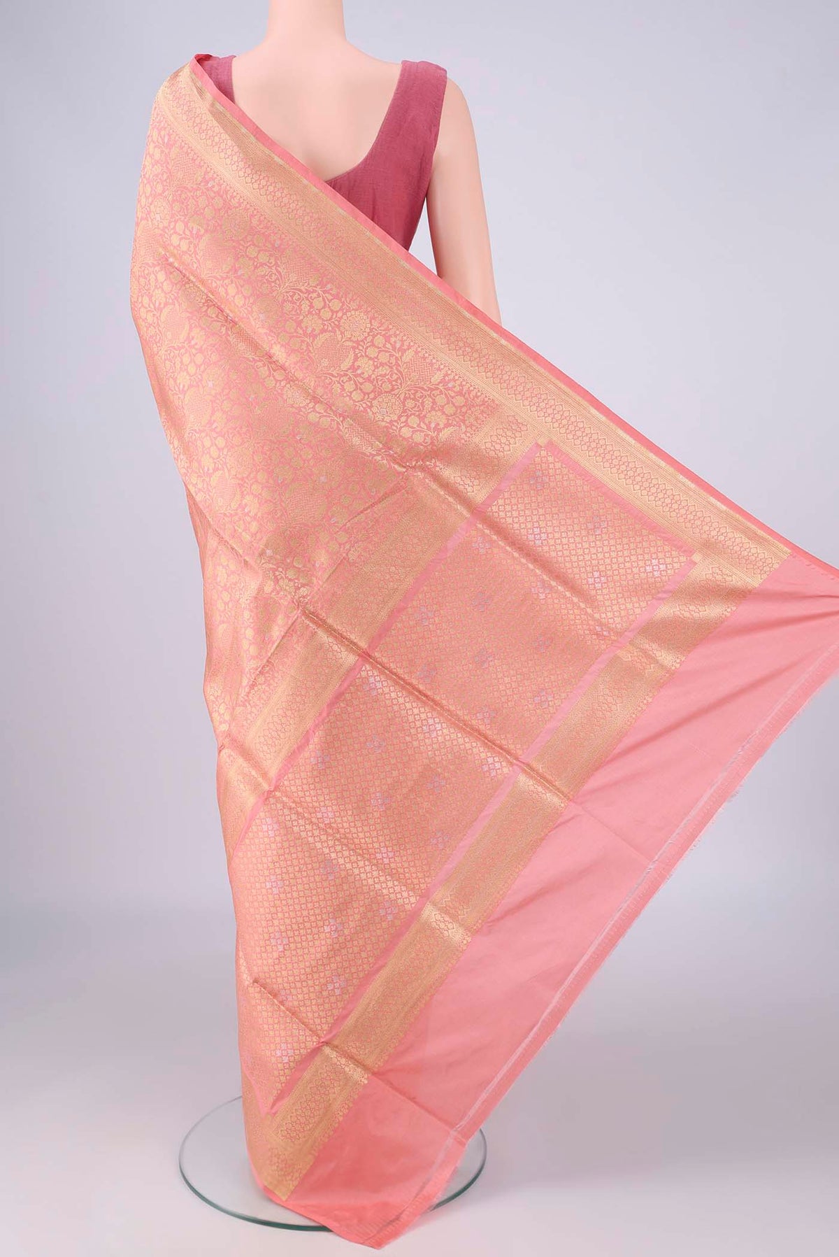 Flat view of Peach Banarasi Silk Saree with Zari Brocade on the body and Zari Border. 