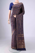 Navy Blue Banarasi Jamavar Saree with Checked design on the body and Zari Border.  displayed on a mannequin