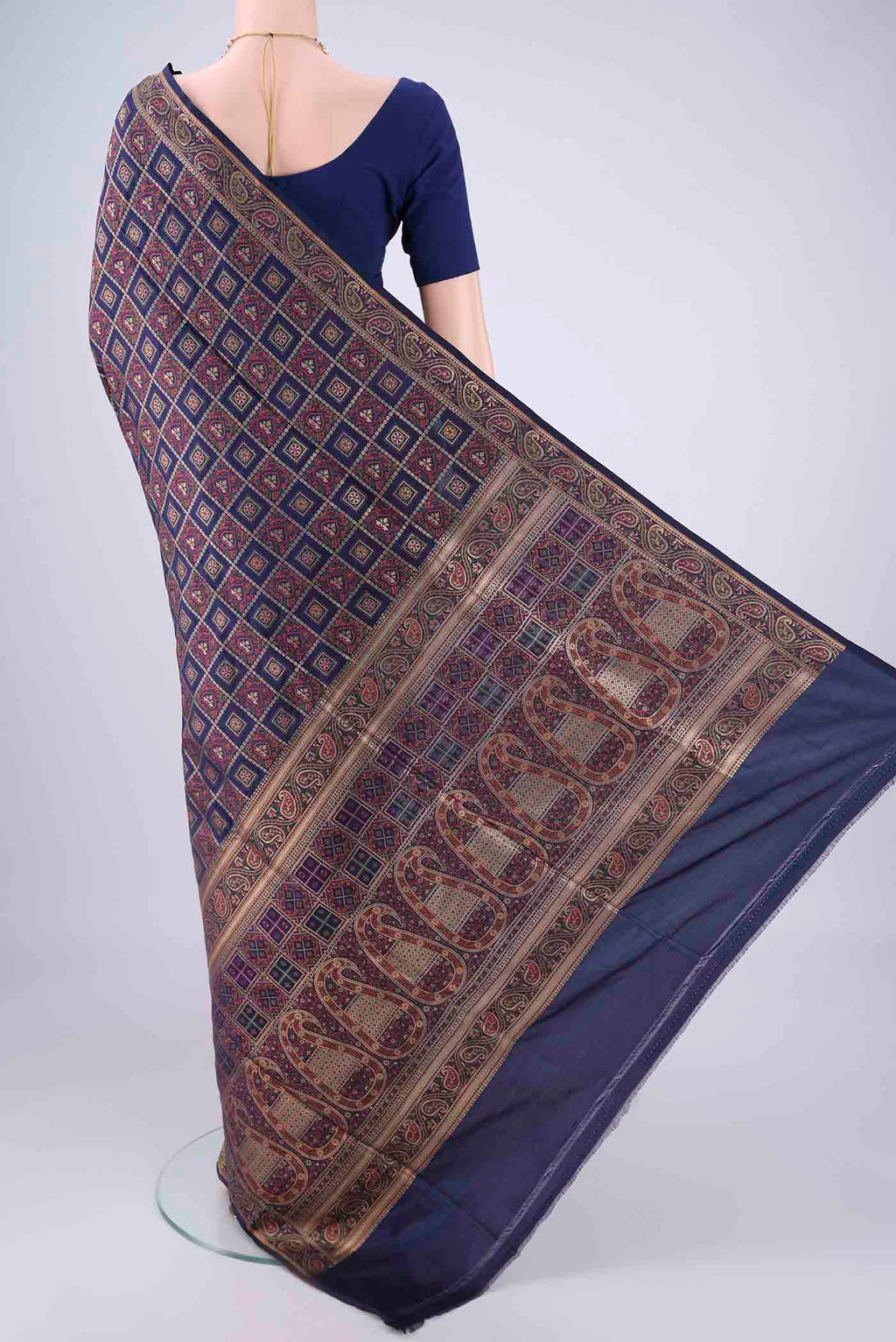 Flat view of Navy Blue Banarasi Jamavar Saree with Checked design on the body and Zari Border. 