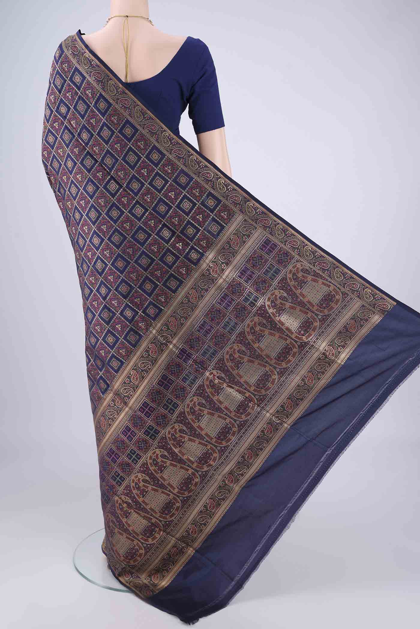 Flat view of Navy Blue Banarasi Jamavar Saree with Checked design on the body and Zari Border. 