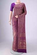 Purple Banarasi Jamavar Saree with Checked design on the body and Zari Border.  displayed on a mannequin